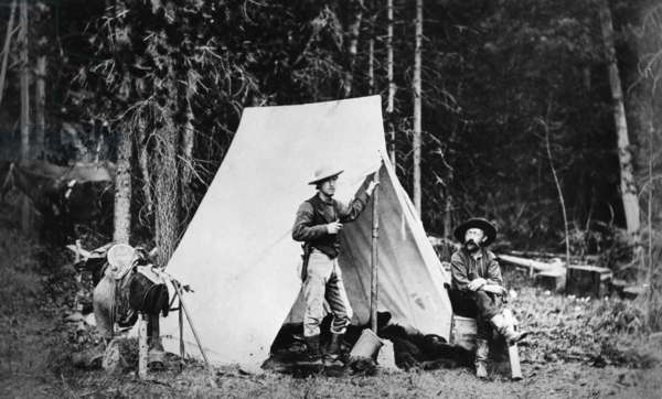 CAMPING, c. 1872 Men, possibly surveyors, in their camp during the geological surveys led by Ferdinand Vandeveer Hayden. Photographed by William Henry Jackson, c. 1872.); Granger / Bridgeman Images